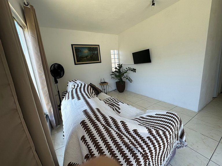 Casa simpática com amplo terreno - REN28